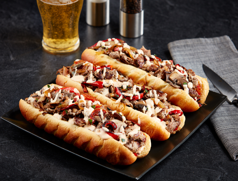 Cheesesteak Sandwiches with Smoked Gouda Sauce