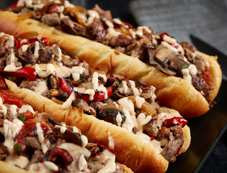 Cheesesteak Sandwiches with Smoked Gouda Sauce