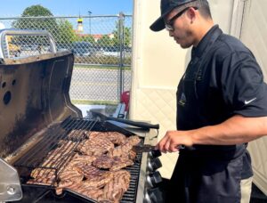 chef tim flores grilling black angus top sirloin for bistek sliders