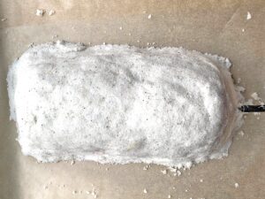 salt crusting a steak
